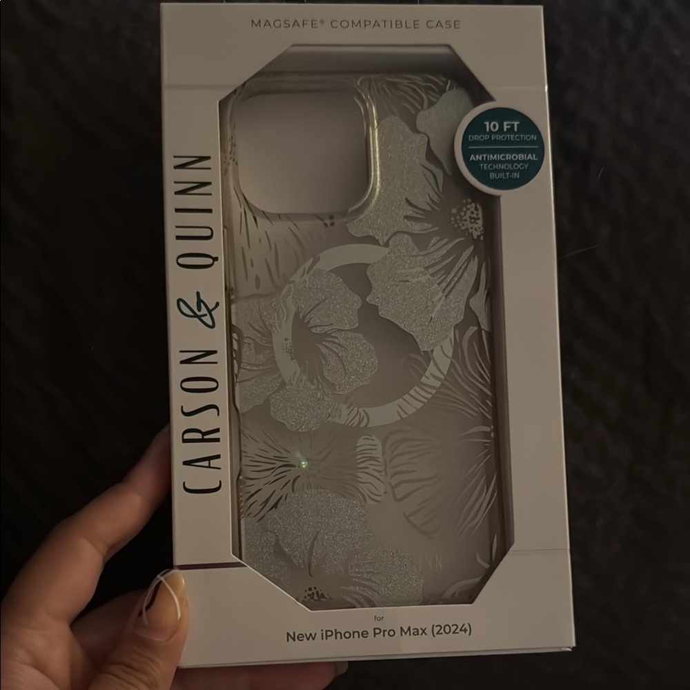 Like new. Silver Hawaiian flower design iPhone 16 ProMax Case by Carson & Quinn.